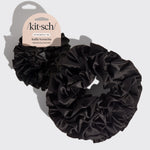 KITSCH Black Ruffle Scrunchie — hero product shot — voluminous ruffle design in black recycled fabric — adds playful texture to any ponytail or updo