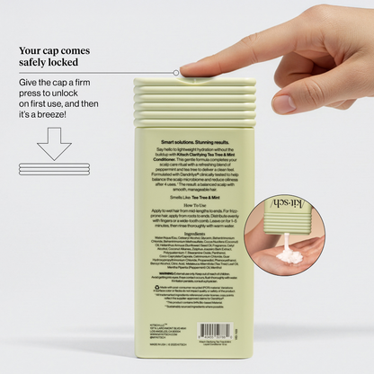 KITSCH Clarifying Tea Tree & Mint Conditioner back label showing the safety-locked cap with hand pressing to unlock on first use