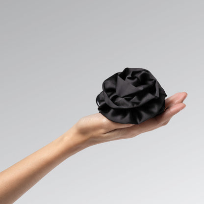 KITSCH Satin Rosette Flat Cloud Clip Black Medium — model hair shot 2