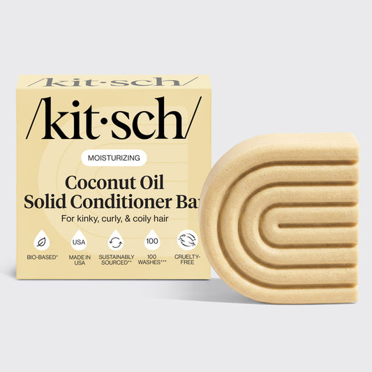 Kitsch Coconut Oil Solid Conditioner Bar with packaging displayed beside the bottle-free conditioner bar for moisturizing kinky, curly, and coily hair.
